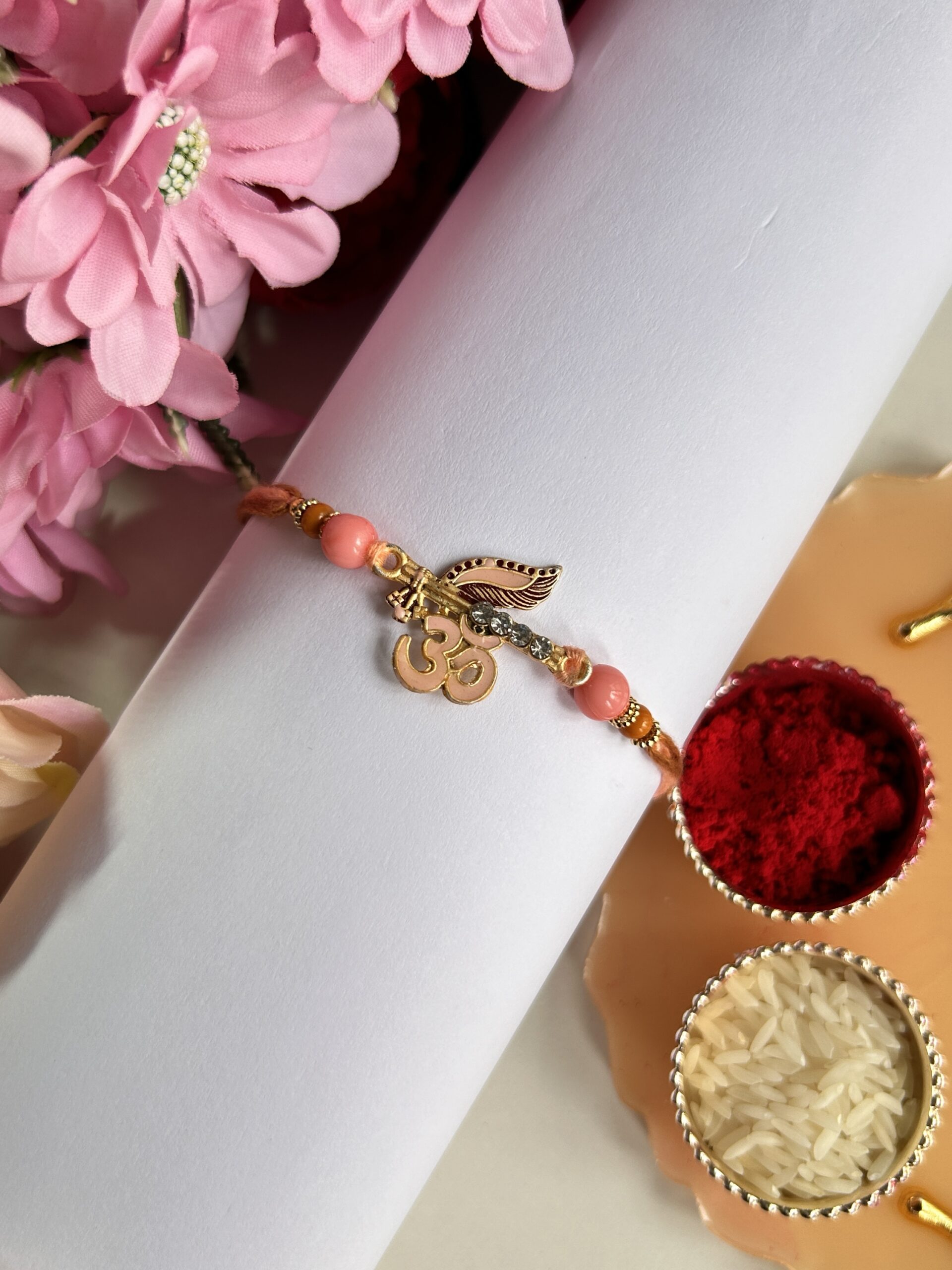 Pink om pendant rakhi design - Image 2