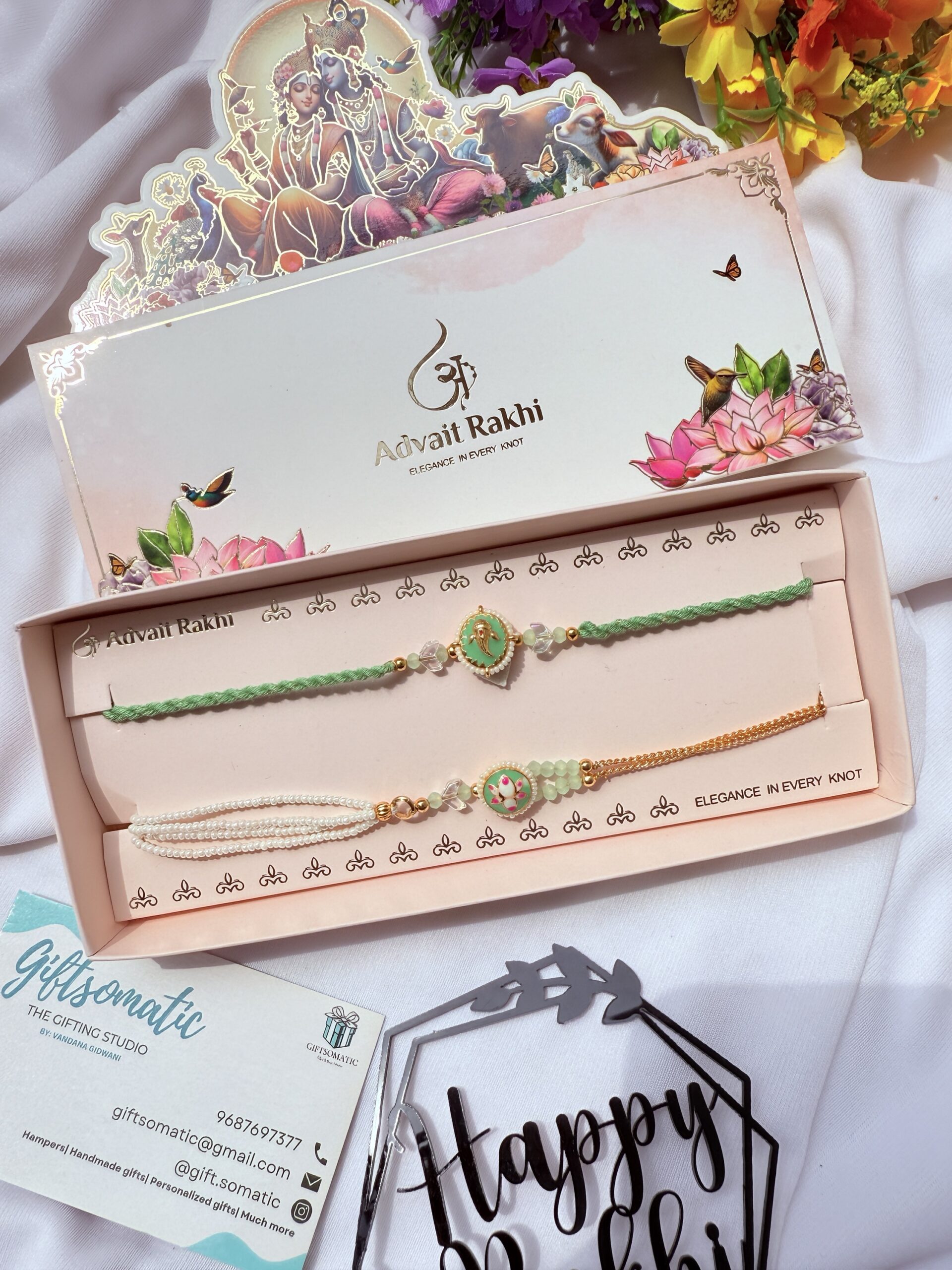 green lotus ganesha couple rakhi set